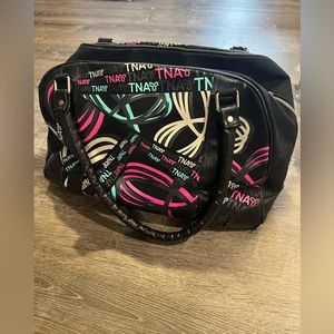 Well-Loved Classic TNA Travel Bag